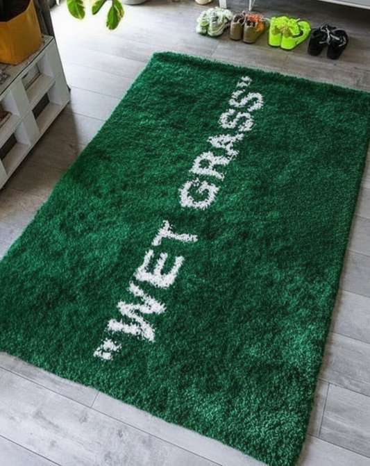 hick hand-tufted "Wet Grass" rug inspired by streetwear culture. Deep green shaggy pile, statement typography. Off-White rug for living room. Wet Grass Rug