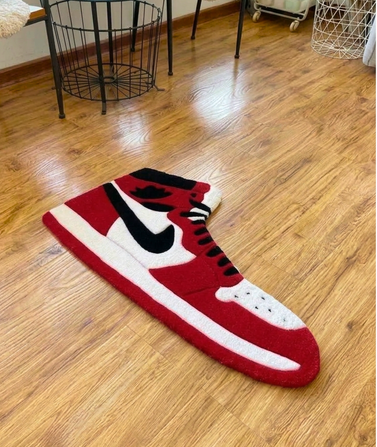 Novelty shoe rug for a dorm or sneaker room, dense red acrylic pile, angled floor view