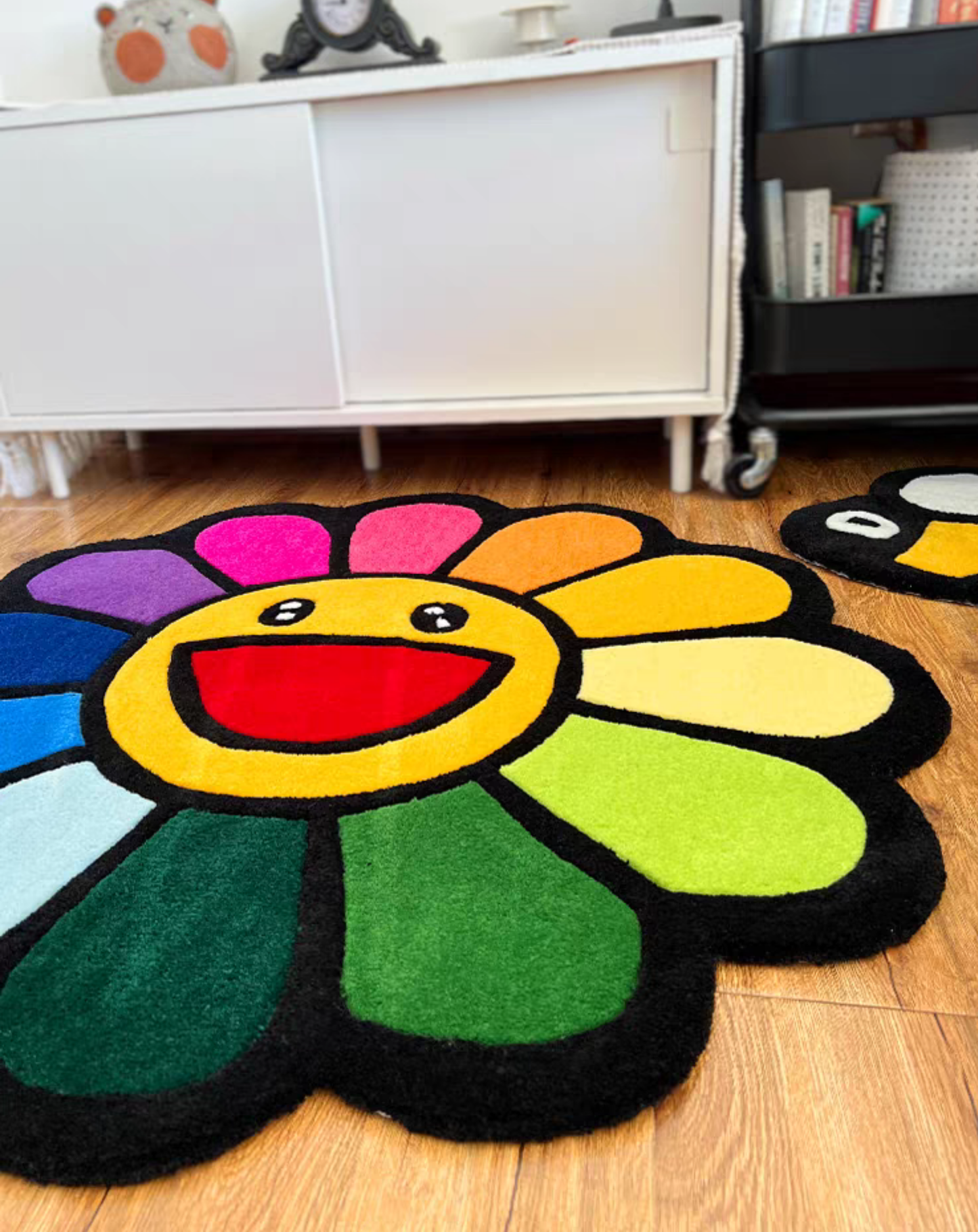 Murakami rug styled in a colorful bedroom room decor setup

