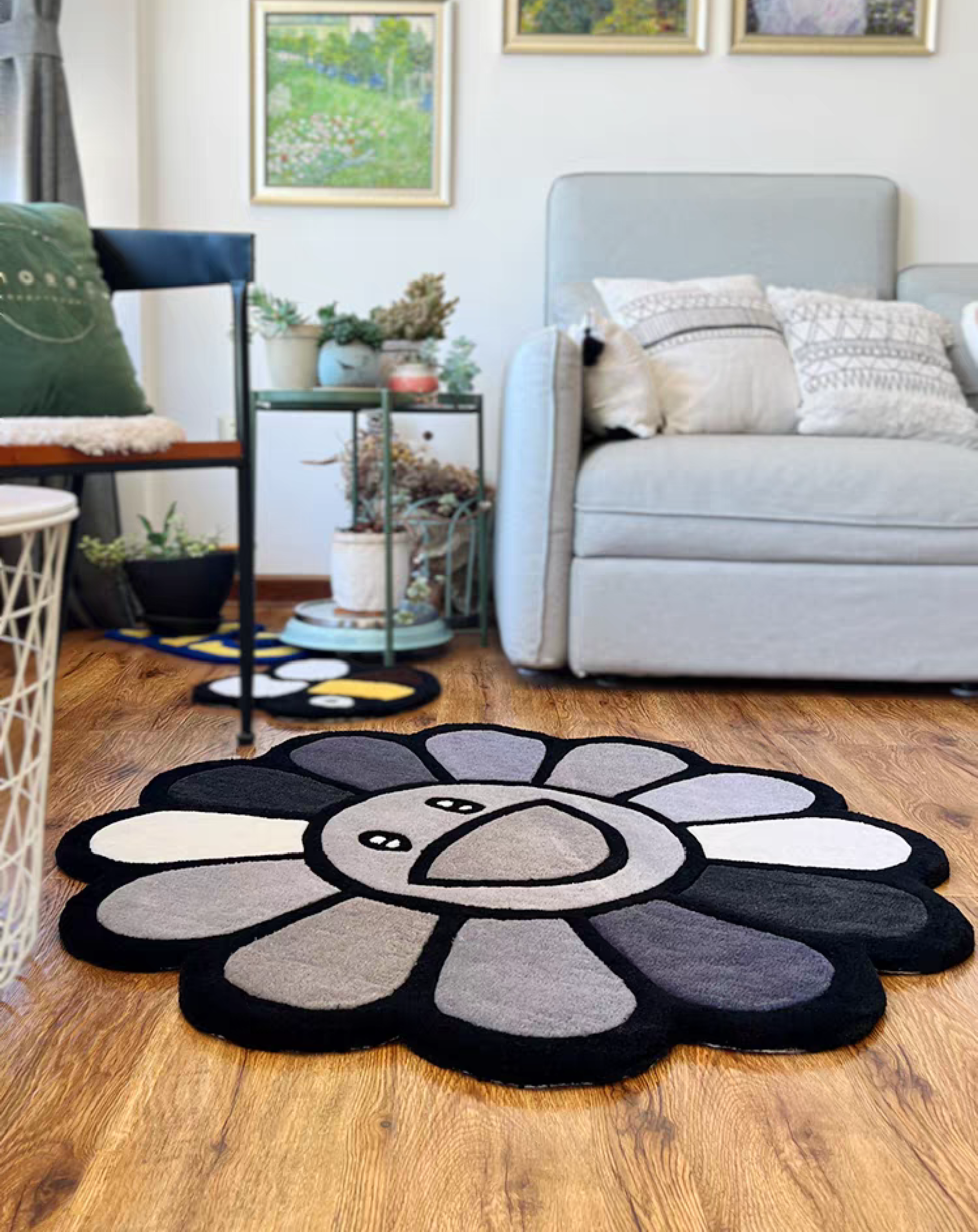 Hand tufted Murakami flower rug in black and grey. Pop art aesthetic rug for bedroom and dark room decor.