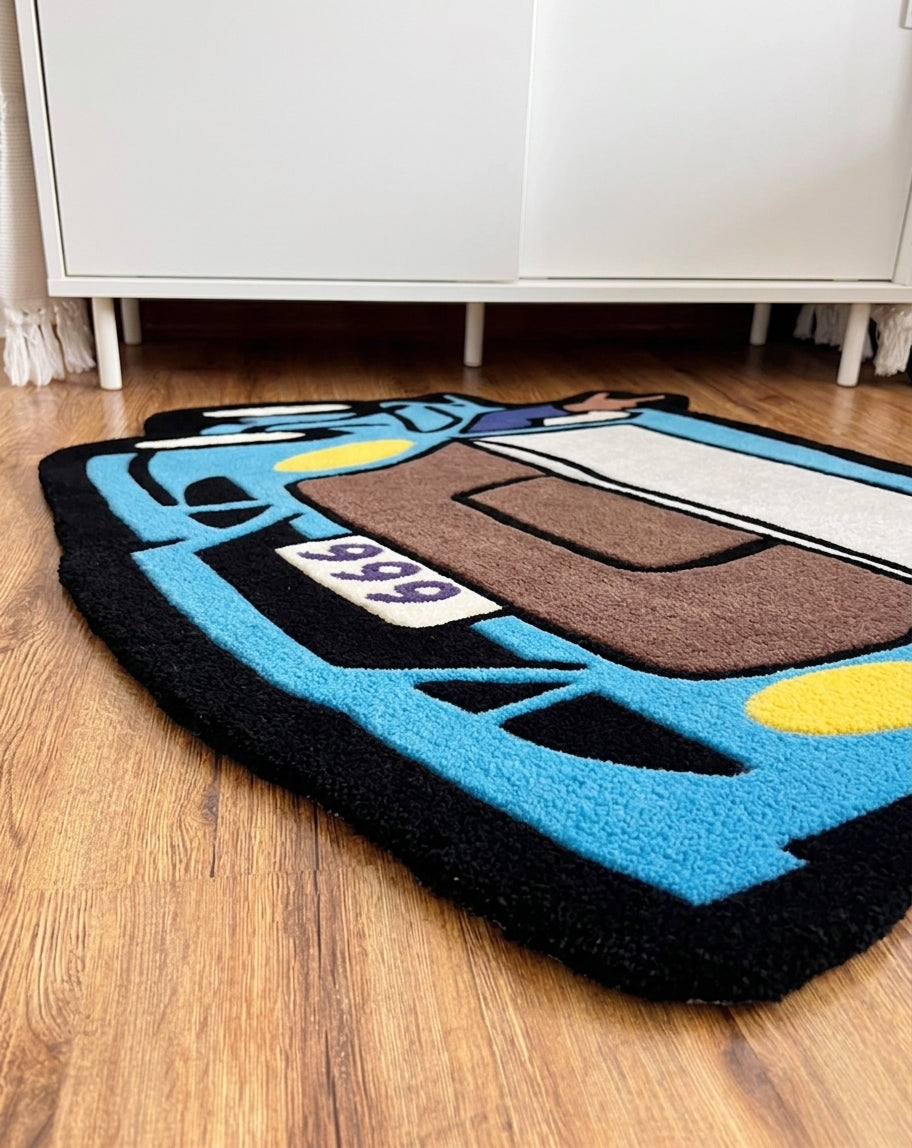 Blue car rug close up of the 999 license plate and yellow headlights in thick hand tufted acrylic yarn