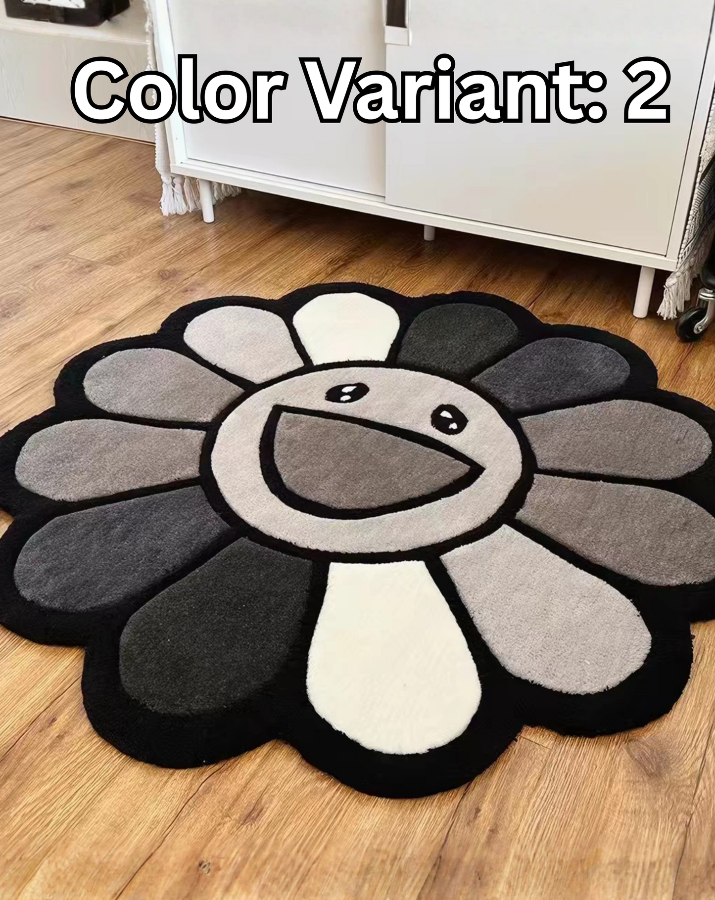Grey monochrome flower shaped round tufted rug styled next to couch in living room, minimal aesthetic bedroom rug shaped cut edges, neutral tone art rug for modern room decor