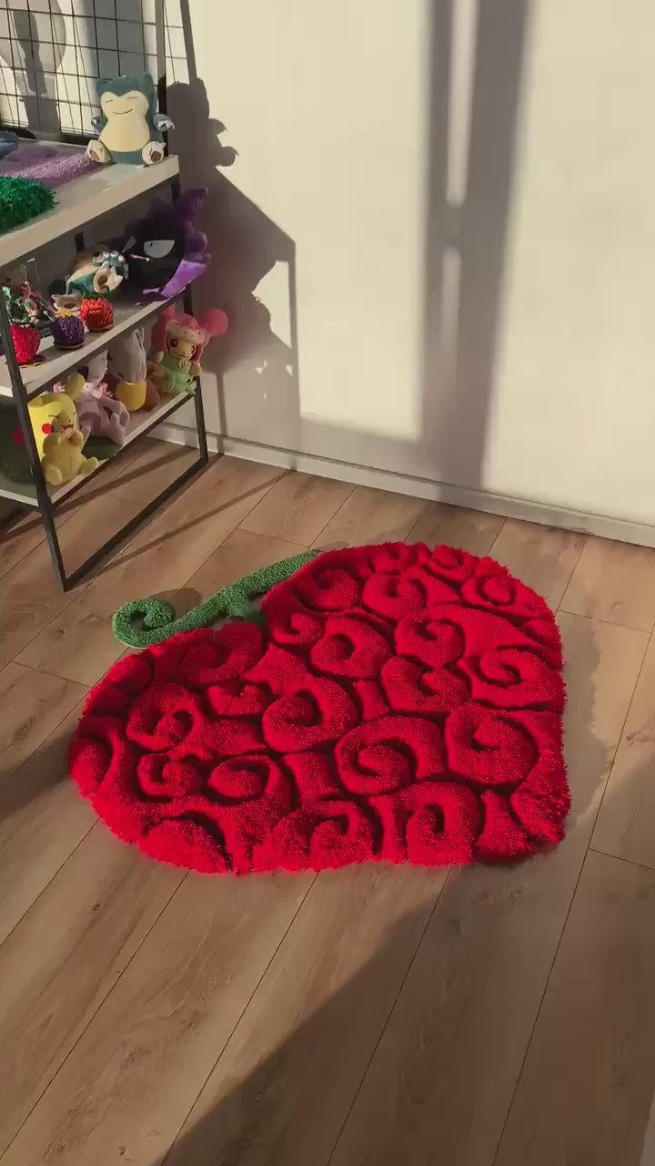 Red swirl fruit rug video, soft tufted acrylic pile with green stem, bedroom floor view