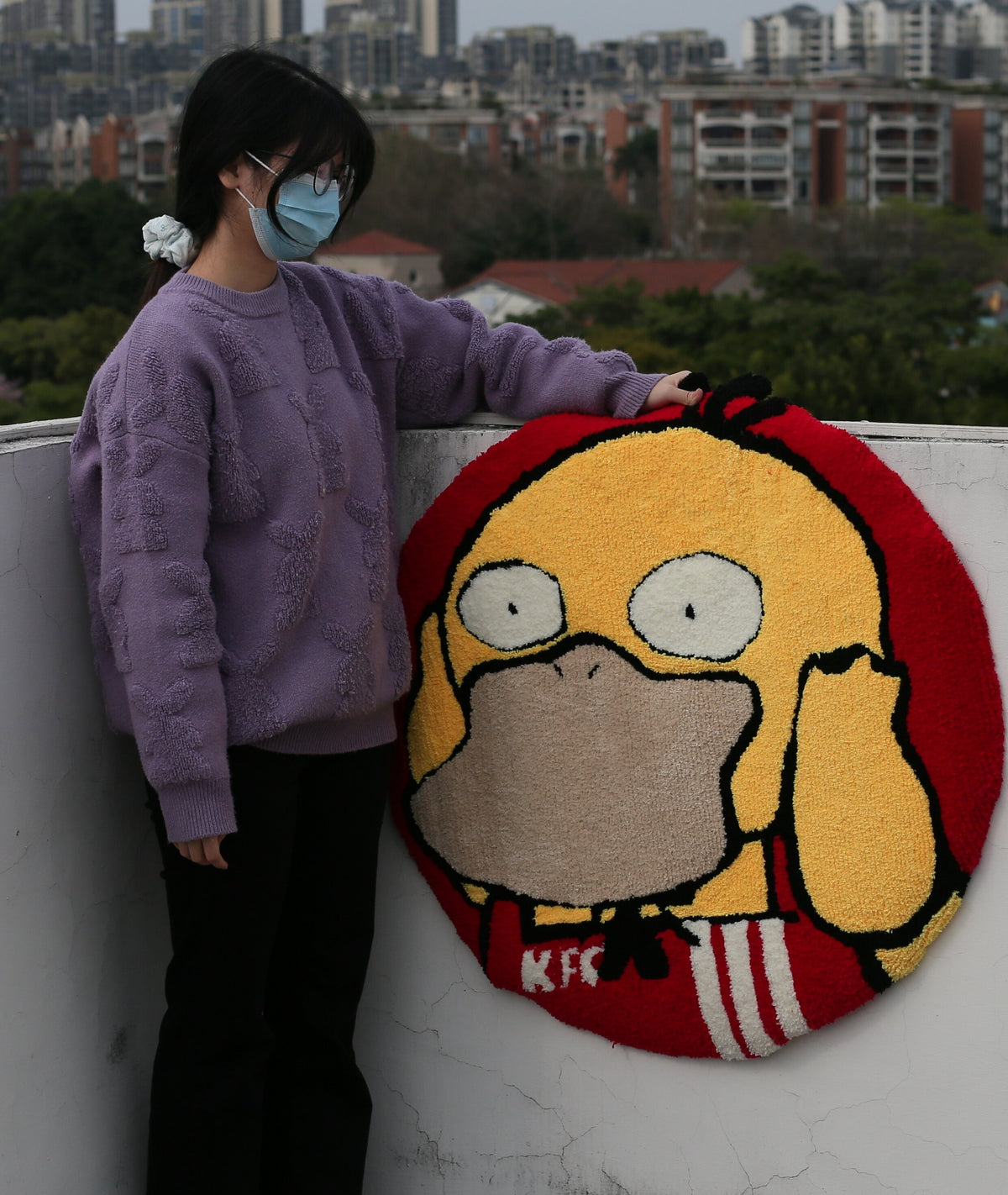 Round Psyduck gaming rug shown upright to display the character face, soft high-density acrylic yarn